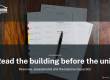 An HOA document package open on a wooden table with a pen resting on it, the paperwork a San Mateo County condo buyer reviews before writing an offer