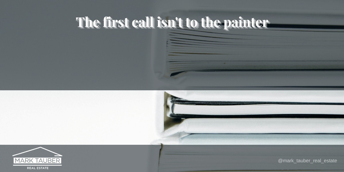 Stacked document folders representing the seller file of disclosures, title information and HOA paperwork opened before any vendor is called